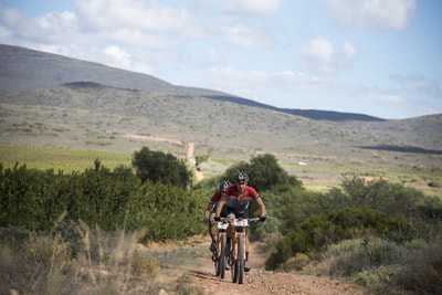 Dylan Rebello and Marco Joubert of Imbuko Momsen during the 2018 ABSA Cape Epic