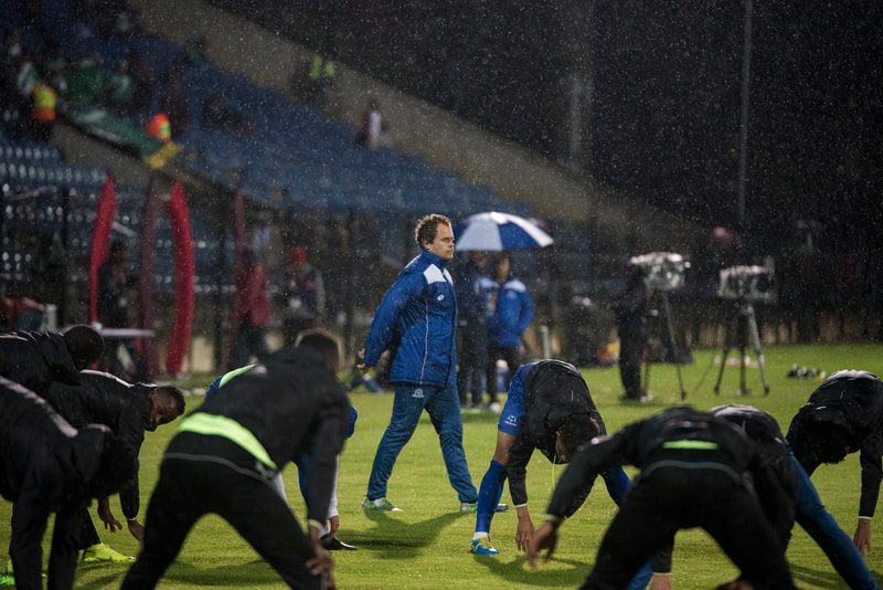 Andrew Coppin, Maritzburg United Physio, making sure all the players are warming up correctly.
Match between Maritzburg United and Bloemfontein Celtic at the Harry Gwala Stadium on the 5th of April 2019 © Image: BOOGS Photography / Andrew Mc Fadden