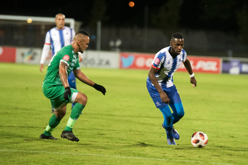 Fortune Makaringe of Maritzburg United, takes on the defence.
Match between Maritzburg United and Bloemfontein Celtic at the Harry Gwala Stadium on the 5th of April 2019 © Image: BOOGS Photography / Andrew Mc Fadden