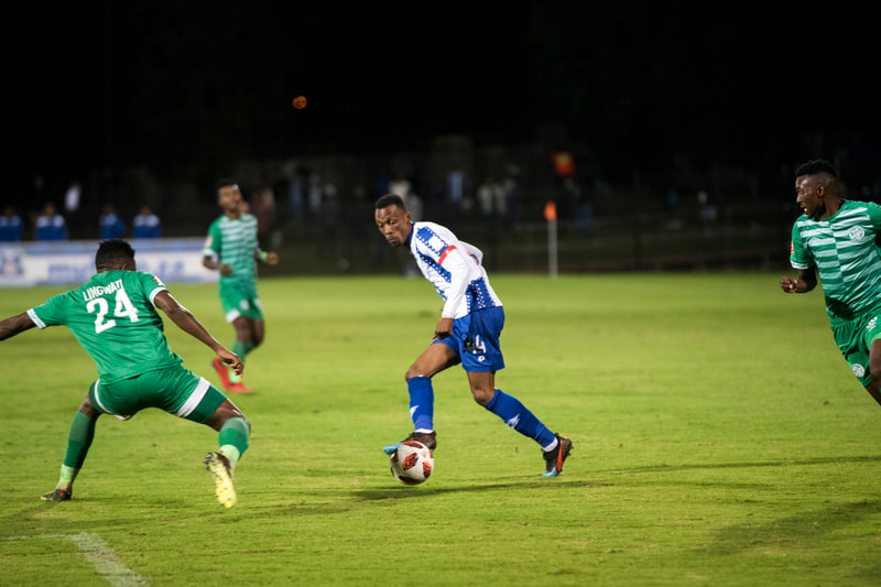 Yannick Zakri of Maritzburg United, crosses in the ball.
Match between Maritzburg United and Bloemfontein Celtic at the Harry Gwala Stadium on the 5th of April 2019 © Image: BOOGS Photography / Andrew Mc Fadden