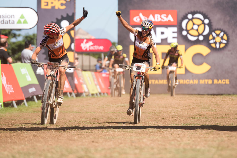 Annika Langvad and Kate Courtney during the 2018 edition of the ABSA Cape Epic. Image: BOOGS Photography / Andrew Mc Fadden