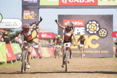 Taking another stage win, Annika Langvad and Kate Courtney of Investec Songo Specialized, during the 2018 ABSA Cape Epic