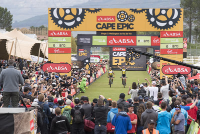 Overal mens winners, Jaroslav Kulhavy and Howard Grotts of InvestecSongoSpecialized crossing the final fisnihs line of the 2018 ABSA Cape Epic