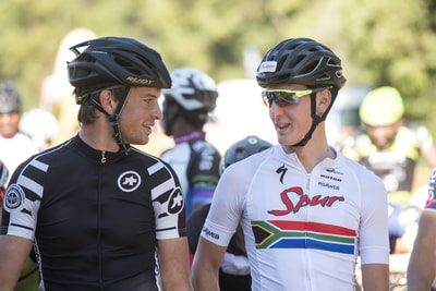 Friends, Stuart Marais and Alan Hatherly, chatting all relaxed before the start of their race at the Cycling SA Cup series, Cascades