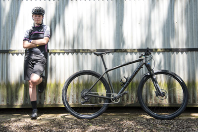 Beani Thies posing with her S-works XCO machine