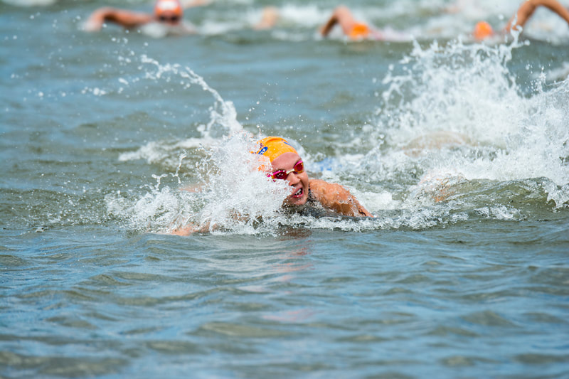 Moments at the 2016 Aquelle Midmar Mile, hosted at Midmar Dam. Photo: ©BOOGS Photography/Andrew Mc Fadden