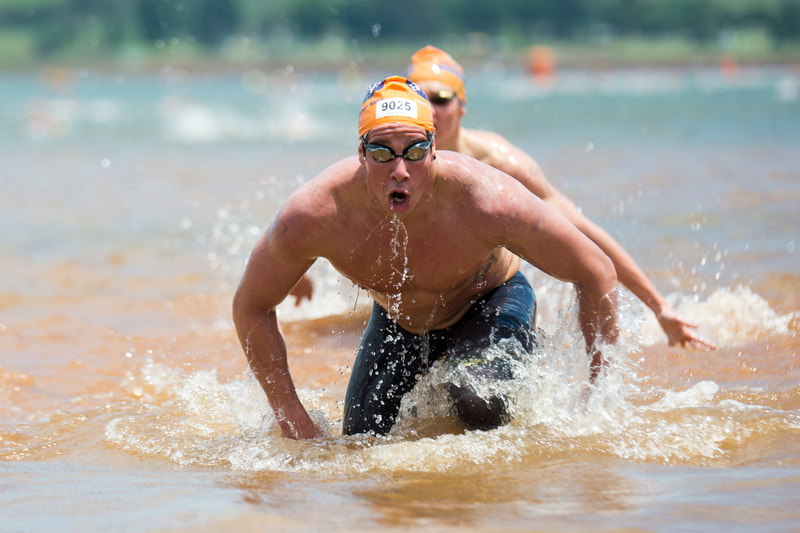 Chad Ho sprints out the water to victory at the 2016 Aquelle Midmar Mile, hosted at Midmar Dam. Photo: ©BOOGS Photography/Andrew Mc Fadden
