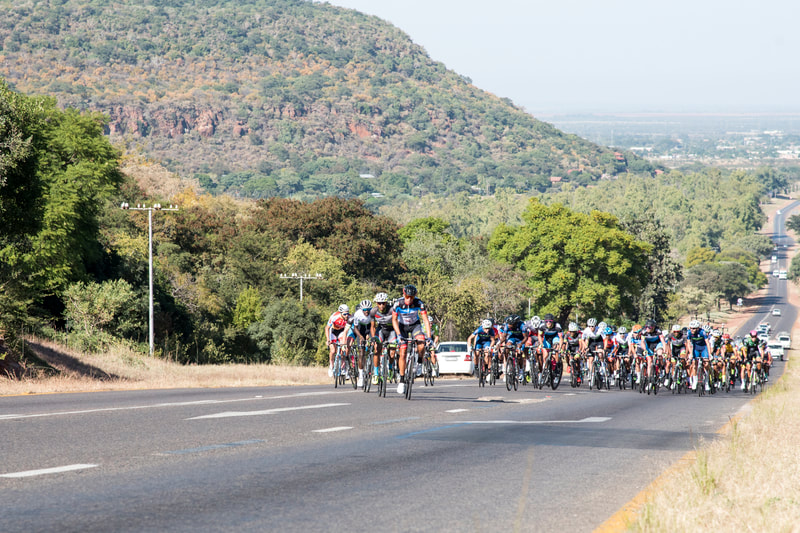 Athletes climb out of Bela Bela on stage 1 of the Tour de Limpopo 2019. Image: © BOOGS Photography / Andrew Mc Fadden